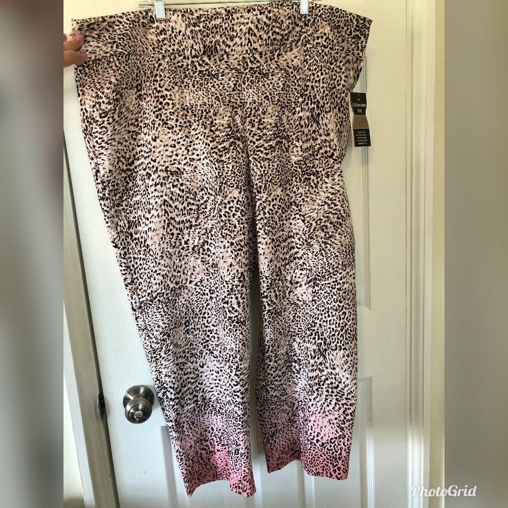 Beige, pink, and black animal print pants
